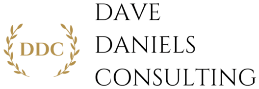 A green background with black text that says " dave daniels consulting ".